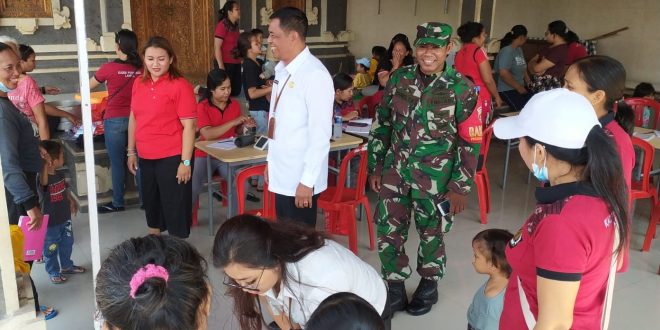 Peduli Kesehatan Warganya Babinsa Desa Peguyangan Dampingi Posyandu Terpadu