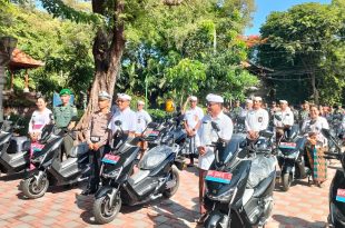 Babinsa Dangin Puri Atensi Penyerahan Sepeda Motor Listrik